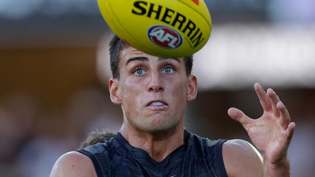 GOLD COAST, AUSTRALIA - FEBRUARY 20: Nick Daicos of the Magpies marks the ball during the 2025 AFL Match Simulation between Brisbane Lions and Collingwood Magpies at People First Stadium on February 20, 2025 in the Gold Coast, Australia. (Photo by Russell Freeman/AFL Photos via Getty Images)