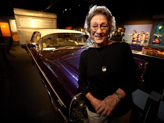 Slim's wife Joy McKean pictured with their 1972 Ford Fairlane Old Purple and touring caravan. Picture: Nathan Edwards