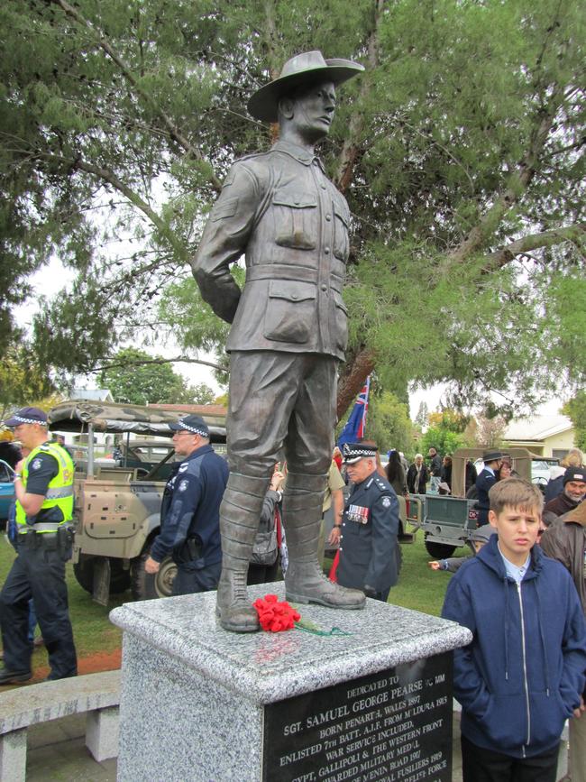 Samuel Tate-Pearse with the bronze statue of his famous great great uncle Samuel Pearse VC MM in Henderson Park, Mildura.