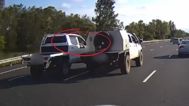 The moment a ute caused another vehicle to spin across a busy motorway in NSW has been captured on dashcam. Picture: Dash Cam Owners Australia Facebook