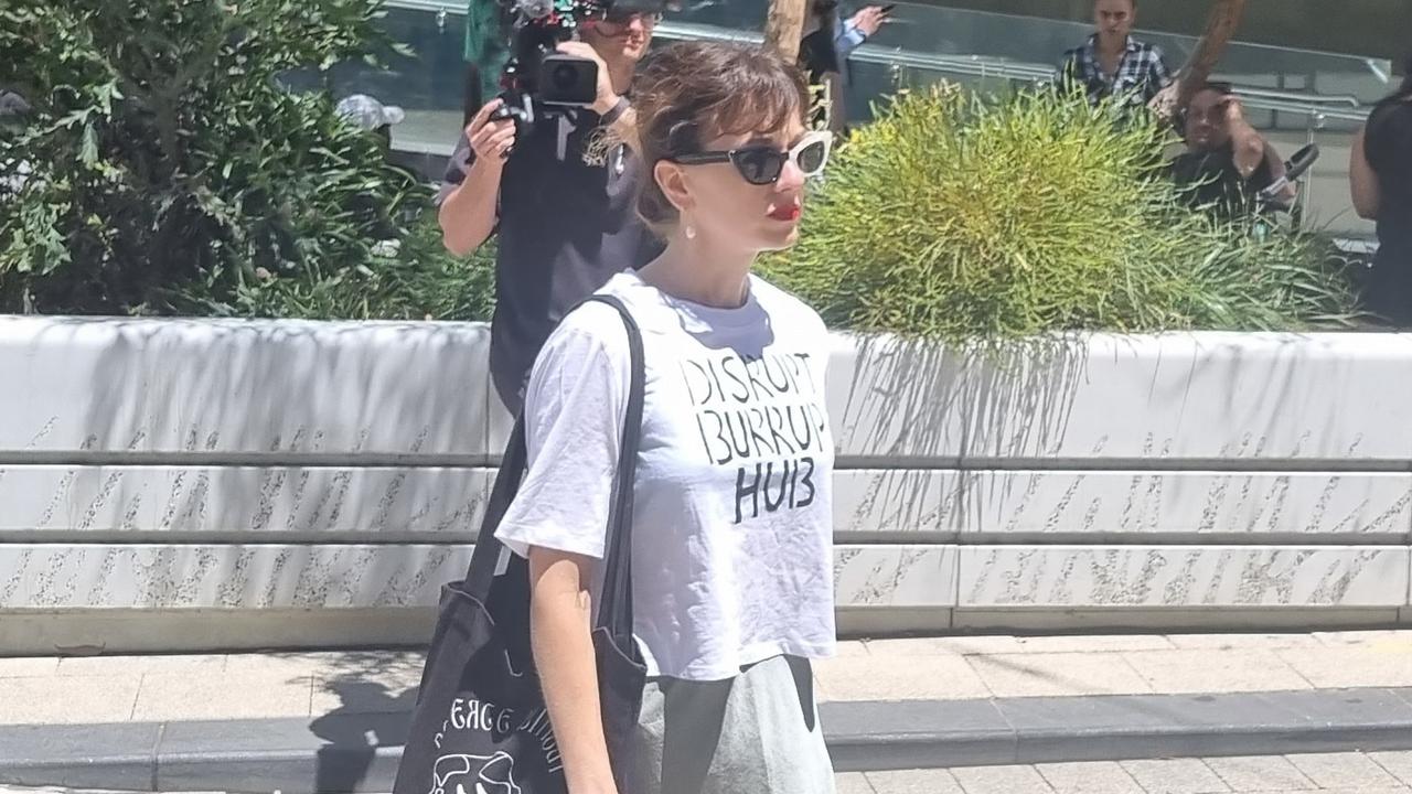 Joana Partyka leaves Perth Magistrates Court after being fined over her protest at the Art Gallery of Western Australia.