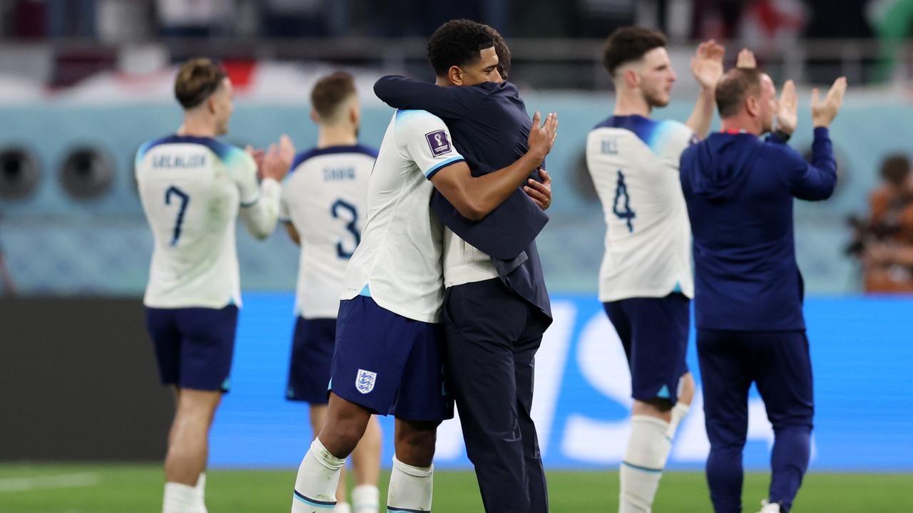 Jude Bellingham and Gareth Southgate, Head Coach of England, celebrate after their side’s victory during the FIFA World Cup Qatar 2022 Group B match between England and IR Iran.