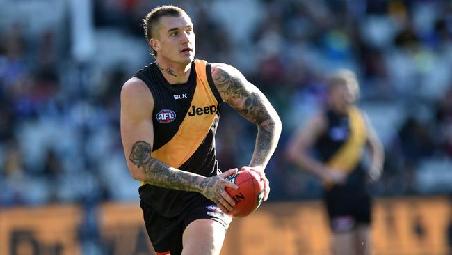 Tiger champ Dustin Martin made his move with three votes in the Herald Sun Player of the Year Award against Brisbane on the weekend. Picture: AAP