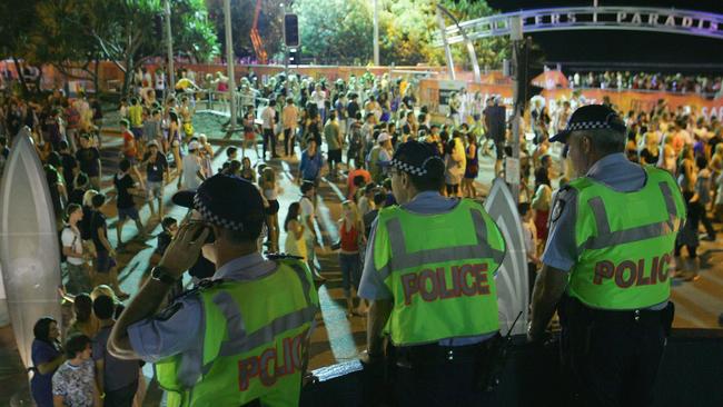 A file picture of police officers watching over Schoolies week celebrations in Surfers Paradise. The Gold Coast kicks off national celebrations with the Queensland school year finishing first. Picture: Sergio Dionisio/Getty Images.