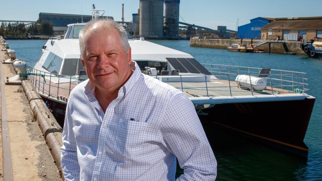 KI Connect owner David Harris in front of the catamaran ferry, docked at Port Adelaide. Picture by Matt Turner.