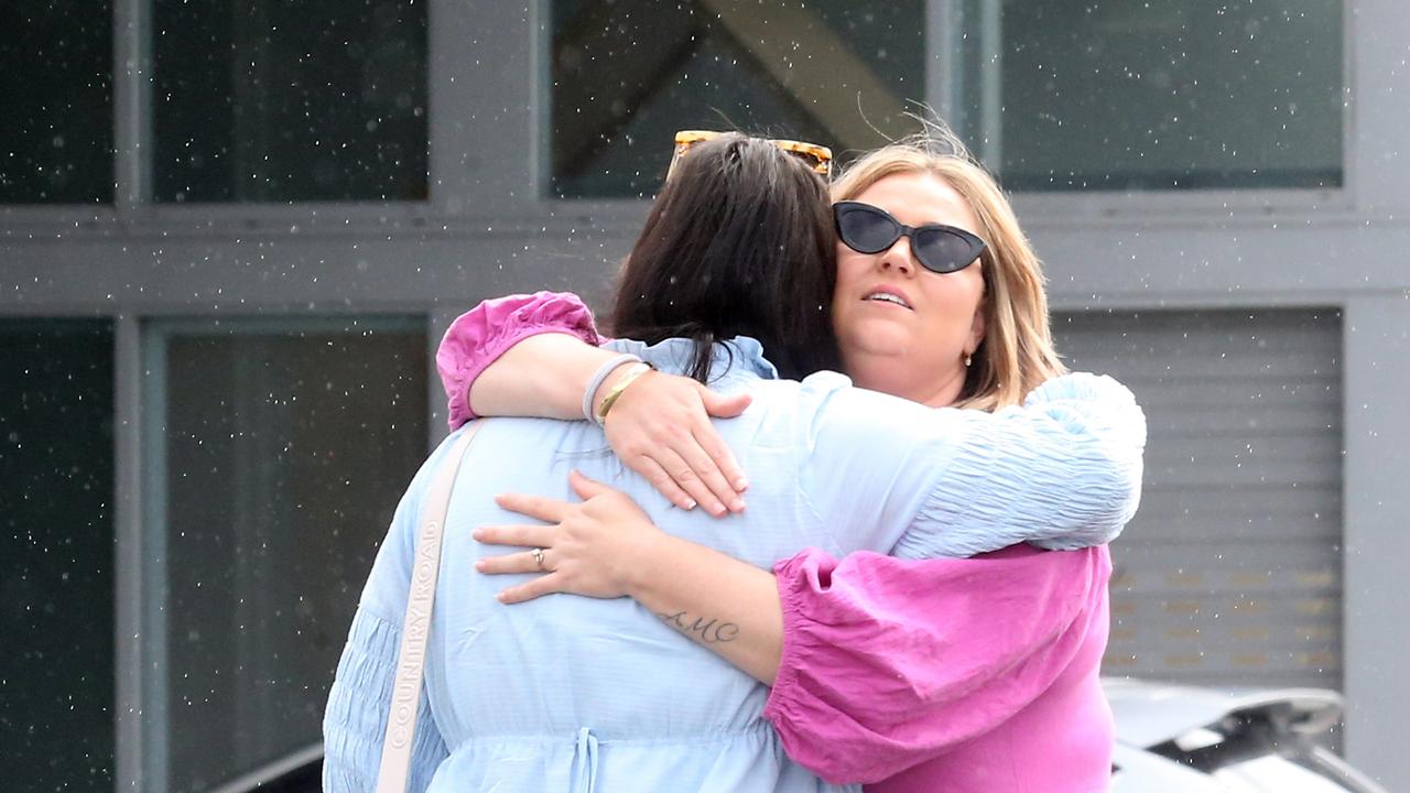 Friends and family comforted each other outside the church. Picture: NCA NewsWire/ Richard Gosling