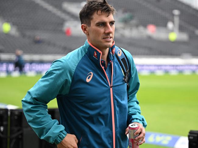 Australia's Pat Cummins arrives as rain delays the start of play on day five of the fourth Ashes cricket Test match between England and Australia at Old Trafford cricket ground in Manchester, north-west England on July 23, 2023. (Photo by Oli SCARFF / AFP) / RESTRICTED TO EDITORIAL USE. NO ASSOCIATION WITH DIRECT COMPETITOR OF SPONSOR, PARTNER, OR SUPPLIER OF THE ECB