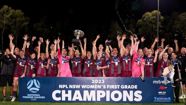 The Macarthur Rams celebrate their title. Photo: Damian Briggs/Speedmedia