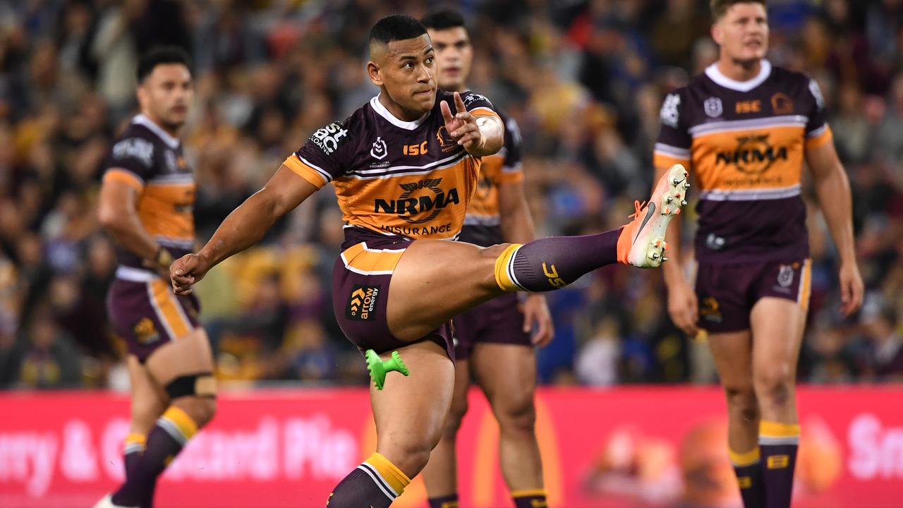 Jamayne Isaako kicks the winning field goal against the Eels in Round 24.