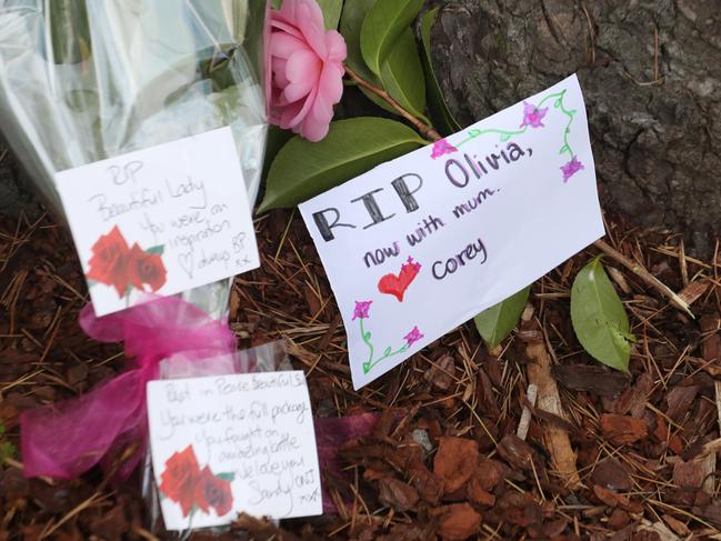 Flowers were left at the The Olivia Newton- John cancer and wellness centre at Heidelberg.