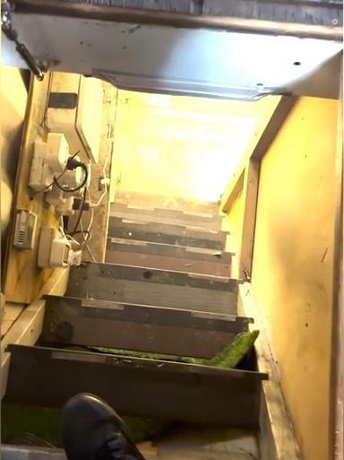 Officers located a trapdoor inside a shipping container shed that led to more shipping containers buried underground, which police allege hid a sophisticated cannabis setup. Picture: Supplied via NCA NewsWire