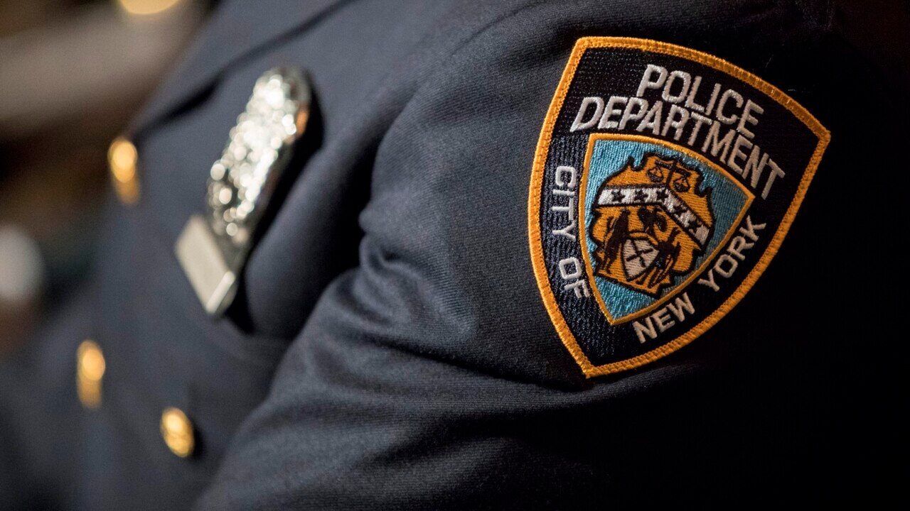 nypd police badge with black band