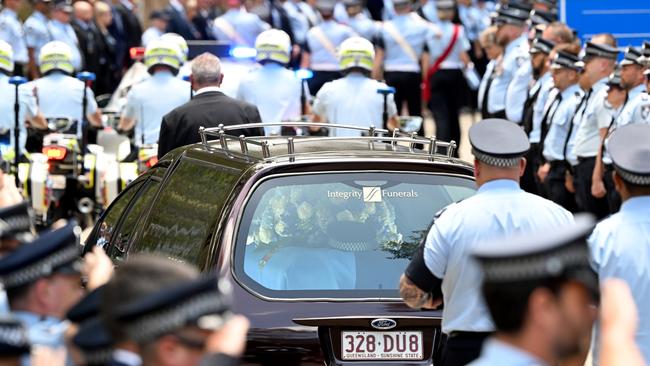 Police form a guard of honour in Brisbane.