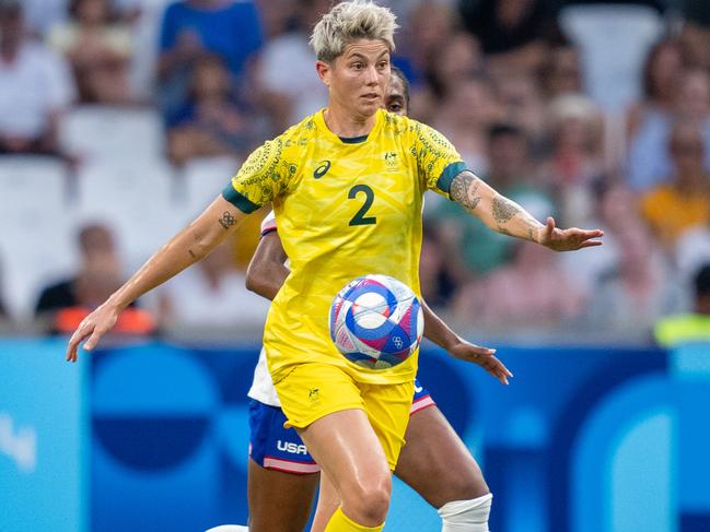 MARSEILLE, FRANCE - JULY 31: Michelle Heyman #2 of Australia is defended by Naomi Girma #4 of the United States  during the Women's Group B match between Australia and USWNT during the Olympic Game Paris 2024 at Stade de Marseille on July 31, 2024 in Marseille, France. (Photo by Brad Smith/ISI/Getty Images).