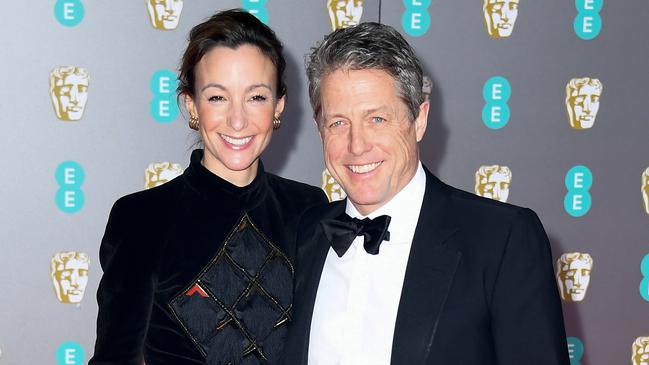 Hugh Grant with wife Anna Elisabet Eberstein at the EE British Academy Film Awards in London in February. (Photo by Gareth Cattermole/Getty Images)