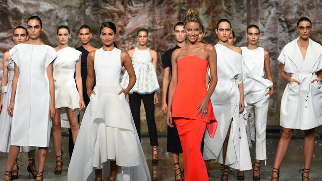 Models Jennifer Hawkins (orange dress) and Shanina Shaik (centre, left) walked the runway during the Myer 2016 Autumn fashion launch. Picture: AAP Image/Dan Himbrechts