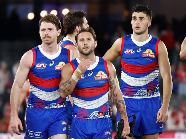 Bramble and one of the teammates who has fallen out of the side as a result of his rise, Caleb Daniel. Picture: Michael Willson/AFL Photos