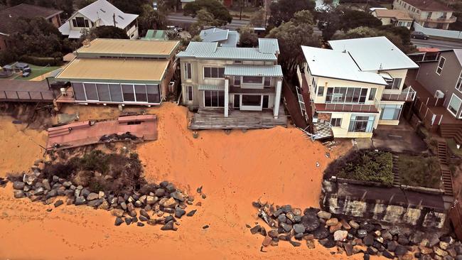 Beach erosion below multimillion dollar properties continues after heavy seas lashed the East Coast of NSW at Wamberal Beach on the NSW Central Coast. Picture: NCA NewsWire / Troy Snook.