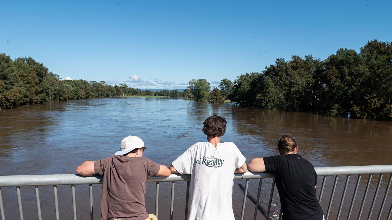 Authorities warn of ‘blue sky’ flooding even as waters rage around NSW ...