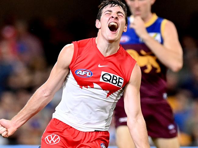 BRISBANE, AUSTRALIA - MARCH 20: Errol Gulden of the Swans celebrates after kicking a goal during the round one AFL match between the Brisbane Lions and the Sydney Swans at The Gabba on March 20, 2021 in Brisbane, Australia. (Photo by Bradley Kanaris/Getty Images)