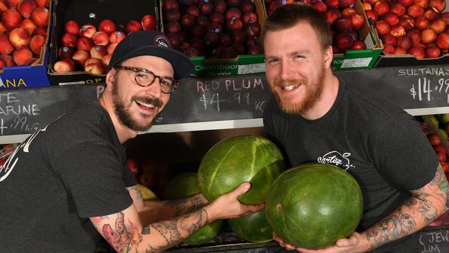 Brothers BJ and Josh with their produce at Carter Bros Fruit and Veg in Silvan. Photo: Julian Smith