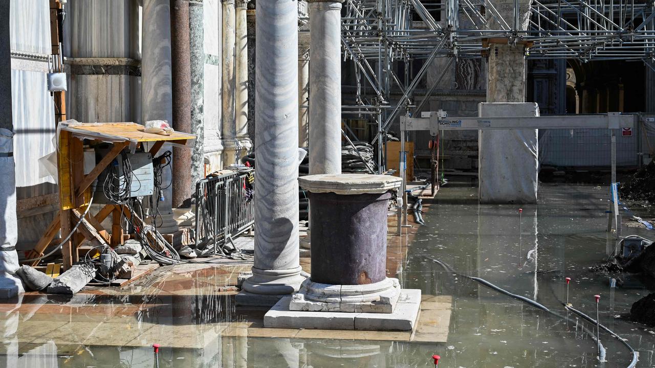 A view shows a flooded restoration site outside St. Mark's basilica. Picture: Andrea Pattaro/AFP