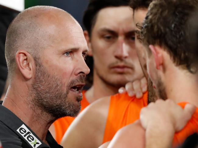 MELBOURNE, AUSTRALIA - AUGUST 13: Mark McVeigh, Interim Senior Coach of the Giants addresses his players during the 2022 AFL Round 22 match between the Western Bulldogs and the GWS Giants at Marvel Stadium on August 13, 2022 in Melbourne, Australia. (Photo by Dylan Burns/AFL Photos via Getty Images)