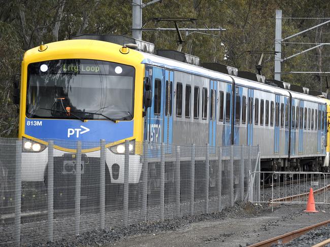 MELBOURNE, AUSTRALIA - NewsWire Photos NOVEMBER 04, 2021: A Metro train runs on the existing track next to the rail duplication project at the Cranbourne rail line in Melbourne's outer south-east. Picture: NCA NewsWire / Andrew Henshaw