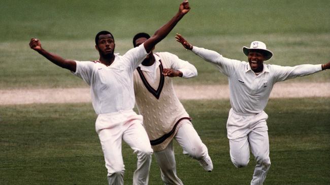 Kings of the world: Courtney Walsh (l) with Phil Simmons and Keith Arthurton celebrating victory over Australia in 1993 Picture: News Corp