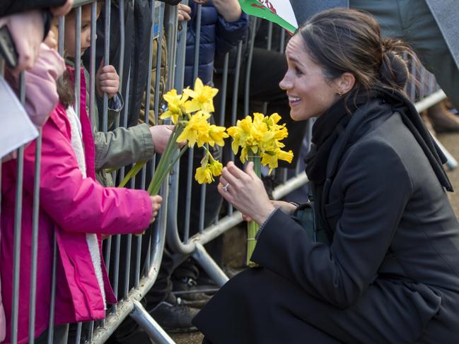 Meghan Markle meets fans as she arrives with Britain’s Prince Harry for a visit to Cardiff Castle in Cardiff, Wales, Thursday, Jan. 18, 2018. Picture: AP