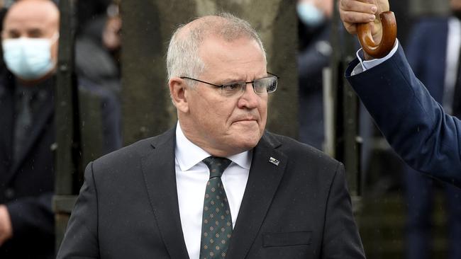 Scott Morrison leaves Bert Newton's state funeral in Melbourne on Friday. Picture: Andrew Henshaw