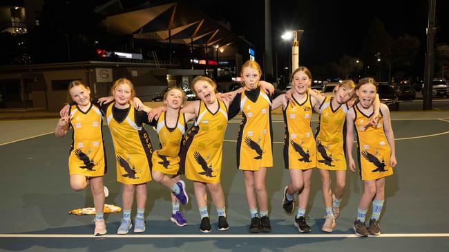 Drysdale Pink under-11 netball team pull their funniest faces.
