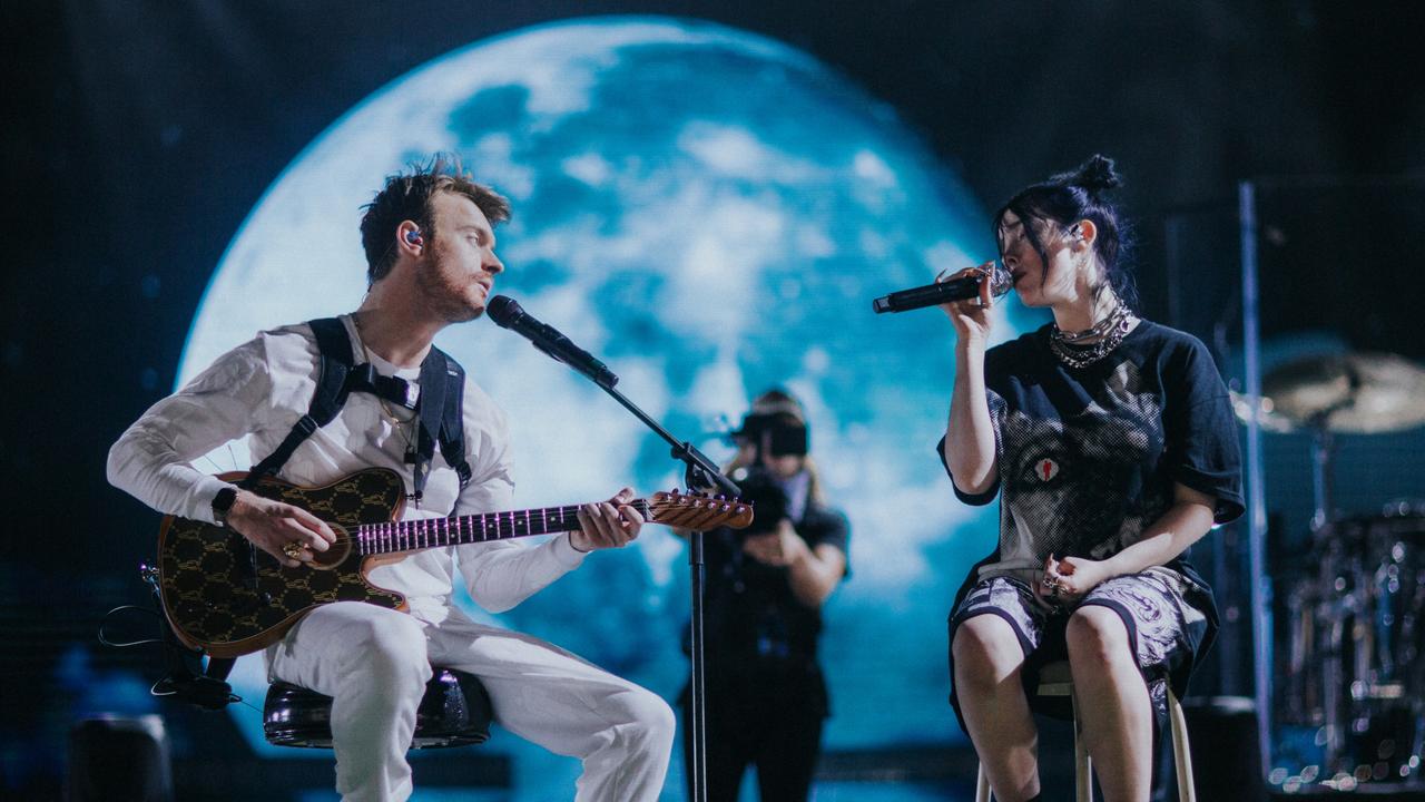 Performing with her producer/brother, Finneas. Picture: Apple TV