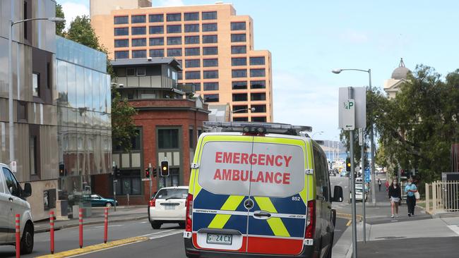 Ambulance parked on Campbell Street. Ambulances who deliver patients to the Royal Hobart Hospital now have less space in the ambulance bay due to tents erected for future Covid patients. Picture: Nikki Davis-Jones