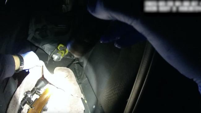 A gun found in a vehicle during the police operation.