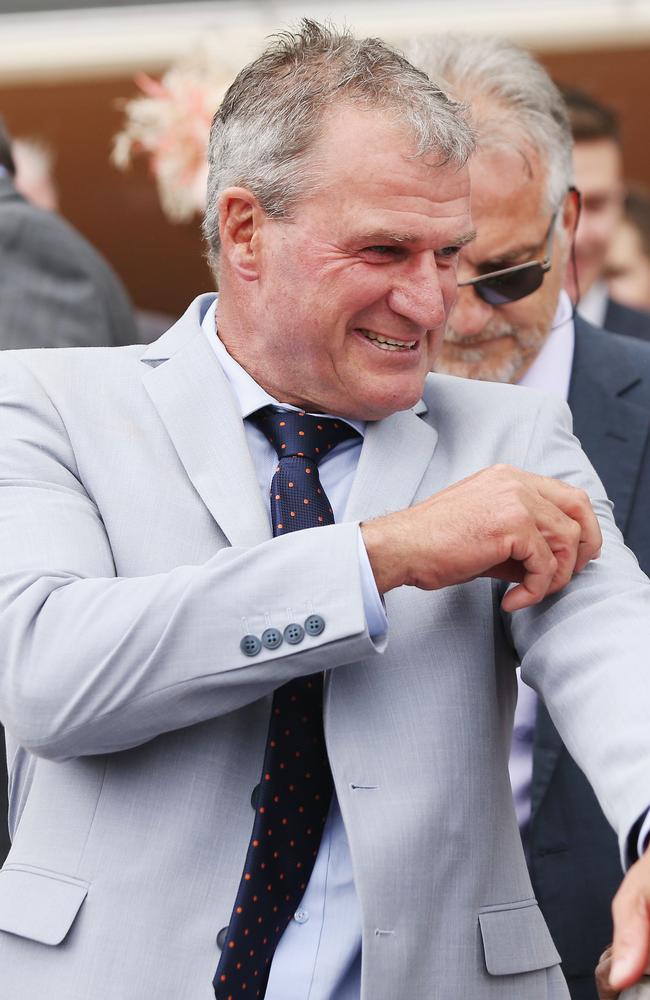 Trainer Darren Weir makes the gesture of pinching himself with four winners. Picture: Getty Images