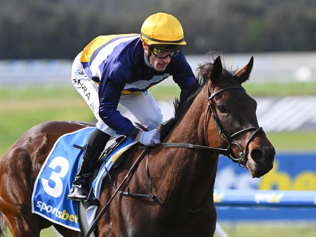 MELBOURNE, AUSTRALIA - SEPTEMBER 04: Mark Zahra riding Pharari winning Race 5, the Sportsbet Feed Handicap - Betting Odds during Melbourne Racing at Sandown Racecourse on September 04, 2024 in Melbourne, Australia. (Photo by Vince Caligiuri/Getty Images)