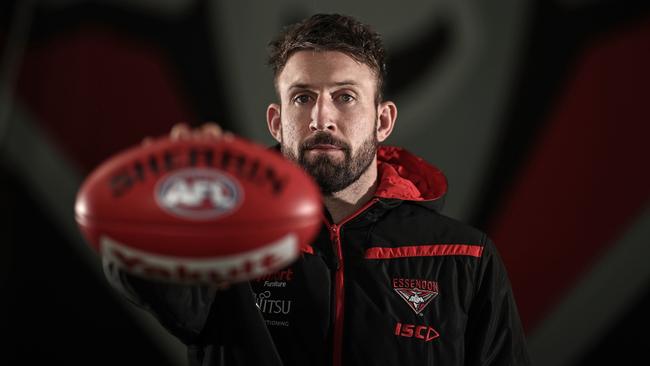 Cale Hooker poses for a photograph during an Essendon Bombers media session at The Hangar in Tullamarine, Melbourne, Thursday, August 29, 2019. (AAP Image/Scott Barbour) NO ARCHIVING