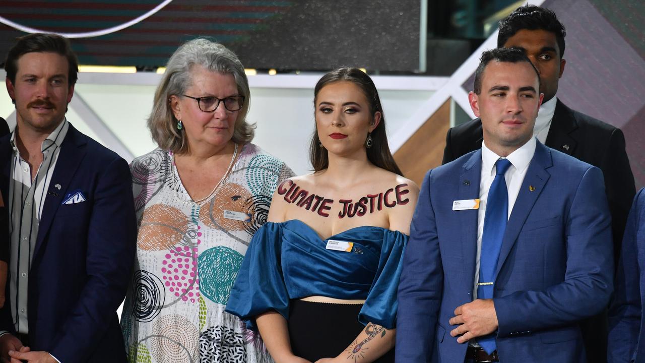 ACT's 2020 Young Australian of the Year finalist Madeline Diamond with ’climate justice’ written on her chest. Picture: Mick Tsikas/AAP