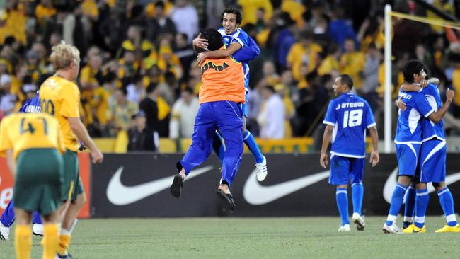 Kuwaiti players celebrate victory over the Socceroos in the 2011 AFC Asian Cup qualifier in Canberra.