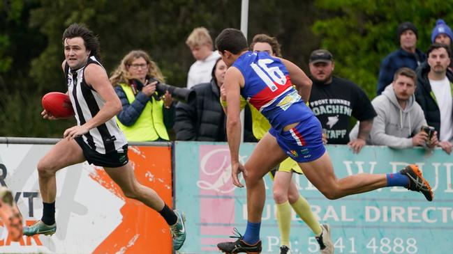 Tom Toner (best on ground) on his way to kicking a goal. Picture: Valeriu Campan