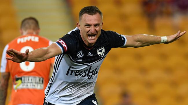 Besart Berisha of the Melbourne Victory celebrates scoring a goal that was later disallowed during the Round 11 A-League match between Brisbane Roar and Melbourne Victory at Suncorp Stadium in Brisbane, Sunday, December 17, 2017. (AAP Image/Dan Peled) NO ARCHIVING, EDITORIAL USE ONLY
