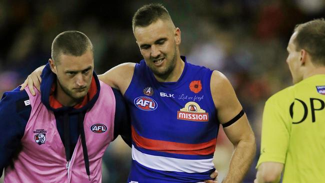 AFL: Round 5 Western Bulldogs v Brisbane Lions Matthew Suckling injures his ankle 1st term Picture:Wayne Ludbey