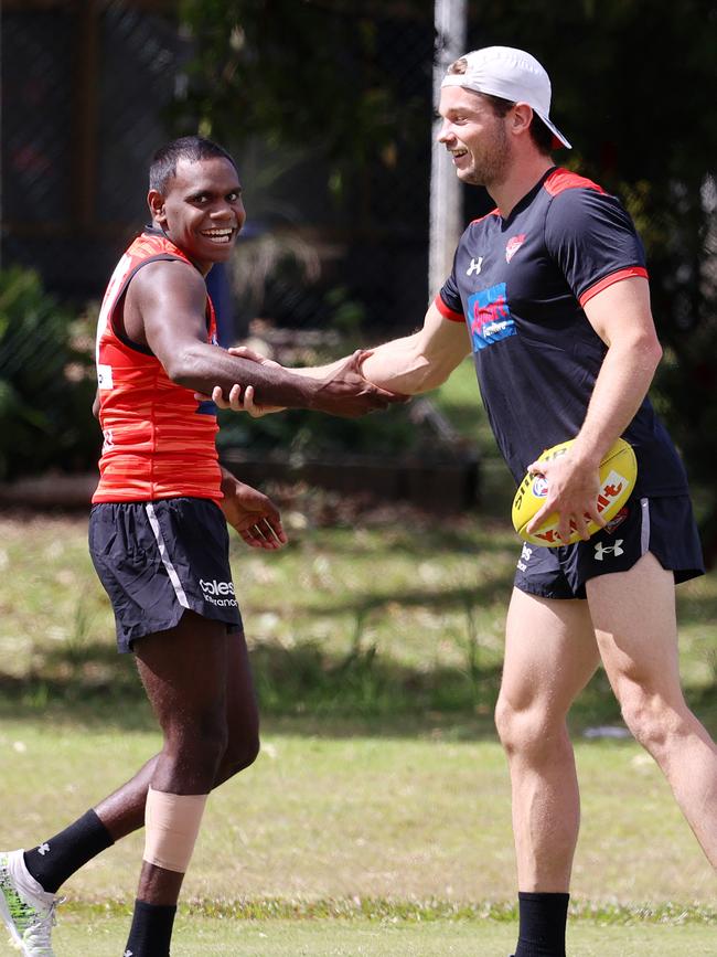 Irving Mosquito with Bombers teammate Patrick Ambrose. Picture: Michael Klein