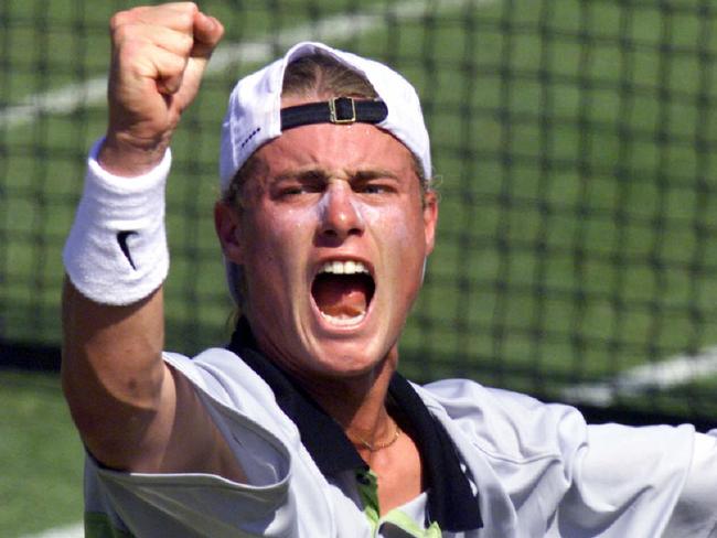 Aust tennis player Lleyton Hewitt celebrates during Australia vs Russia Davis Cup singles semi final tie rubber match in Brisbane 24 Sep 1999. a/cthewitt/safin/match