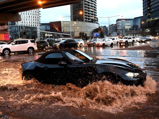 Flooding hits Montague St after heavy rain overnight in Melbourne. Picture: Nicole Garmston