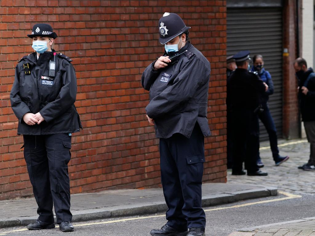 Police officers stand guard outside the King Edward VII hospital in London where Prince Philip, Duke of Edinburgh remains. Picture: AFP