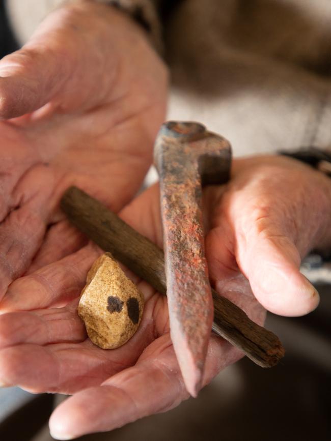 Jim Kerr’s spike, wood and rock from the Death Railway. Picture: Maxim Drygin.