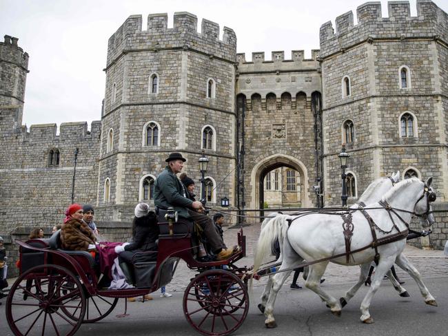 The carriage Meghan and Prince Harry use might have more gold on it than this one. Picture: AFP/Tolga Akmen