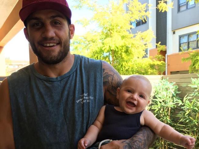 Blake Ferguson with his baby son Harlo.